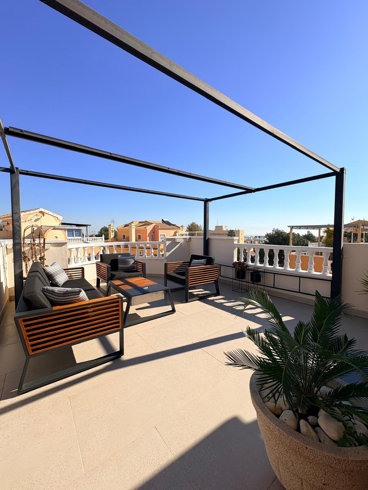 Boutique Mediterranean Duplex with Rooftop Lounge & Open Views