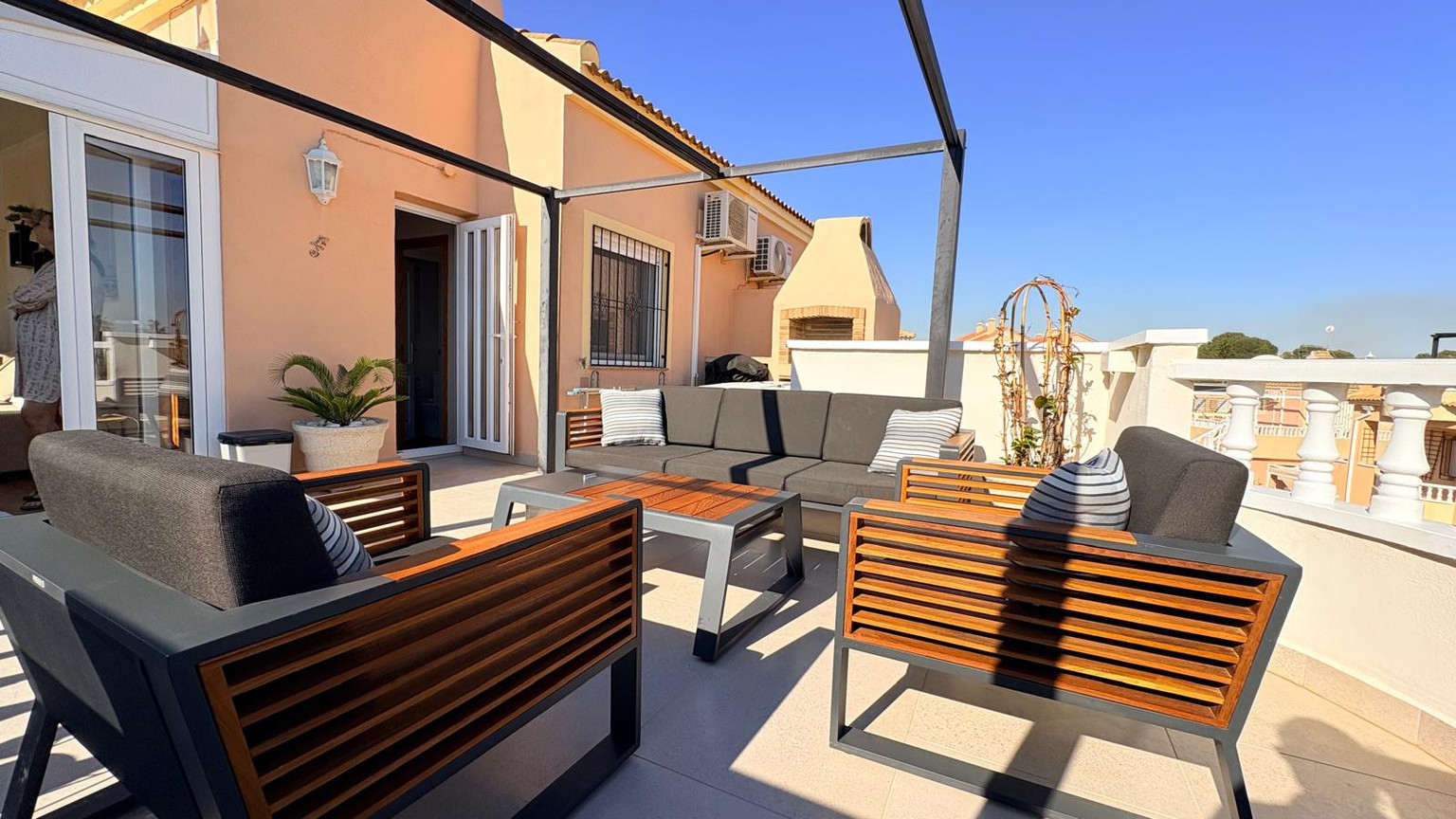 Boutique Mediterranean Duplex with Rooftop Lounge & Open Views