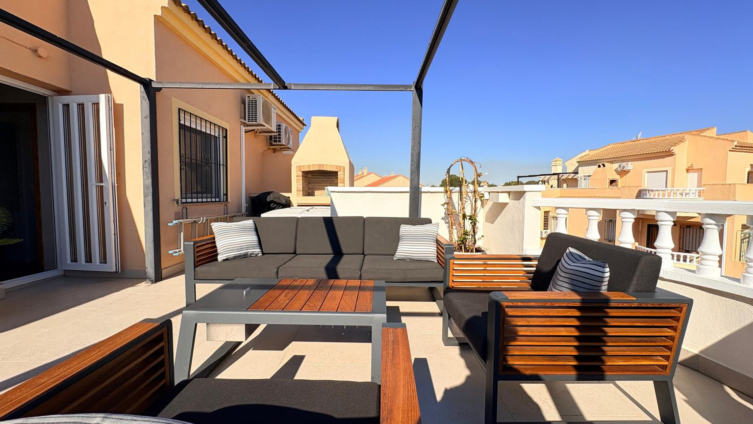 Boutique Mediterranean Duplex with Rooftop Lounge & Open Views