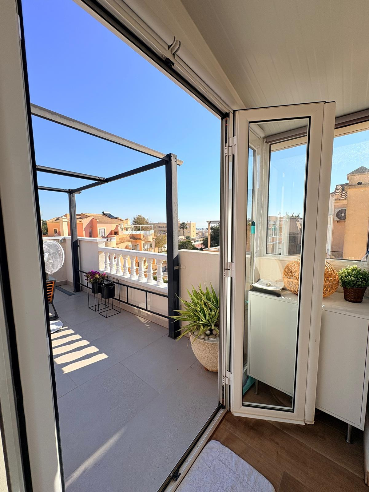 Boutique Mediterranean Duplex with Rooftop Lounge & Open Views