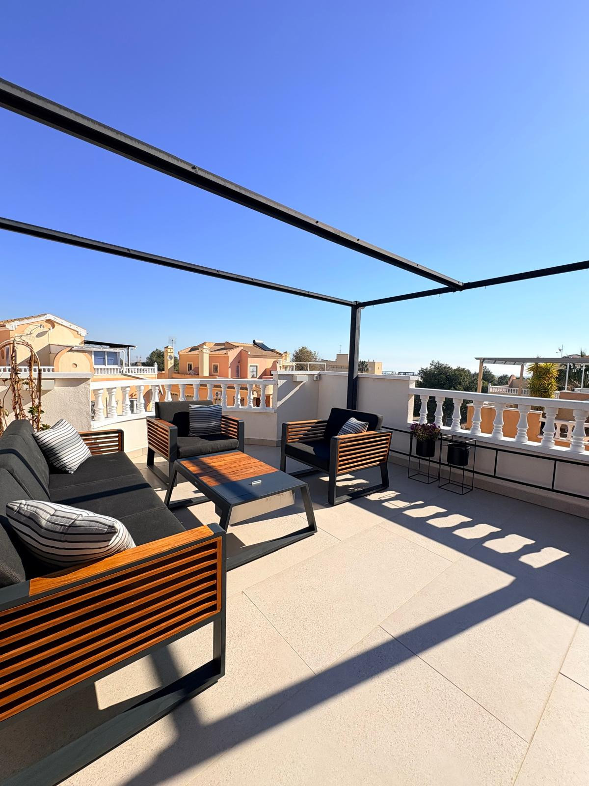 Boutique Mediterranean Duplex with Rooftop Lounge & Open Views