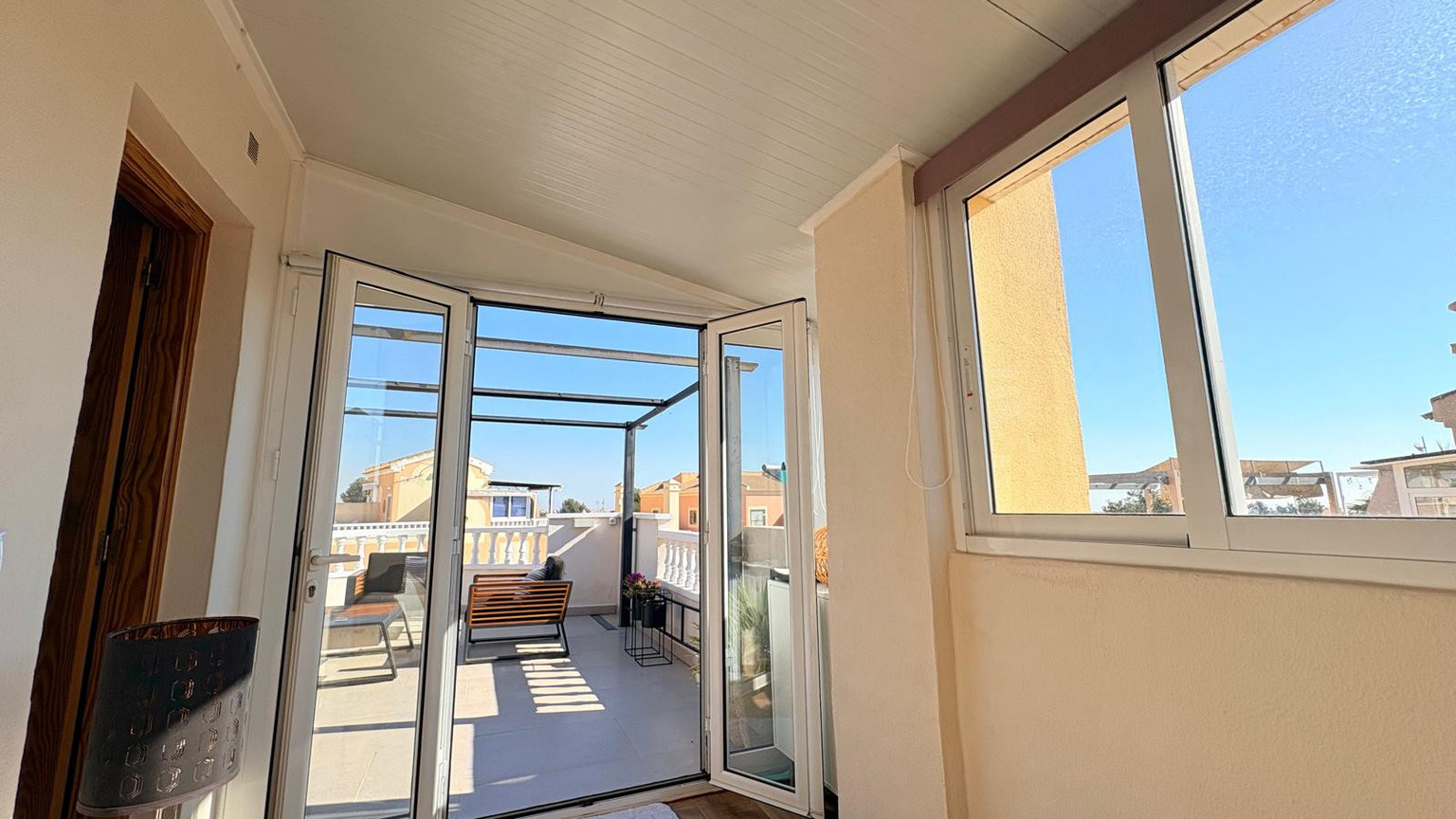 Boutique Mediterranean Duplex with Rooftop Lounge & Open Views