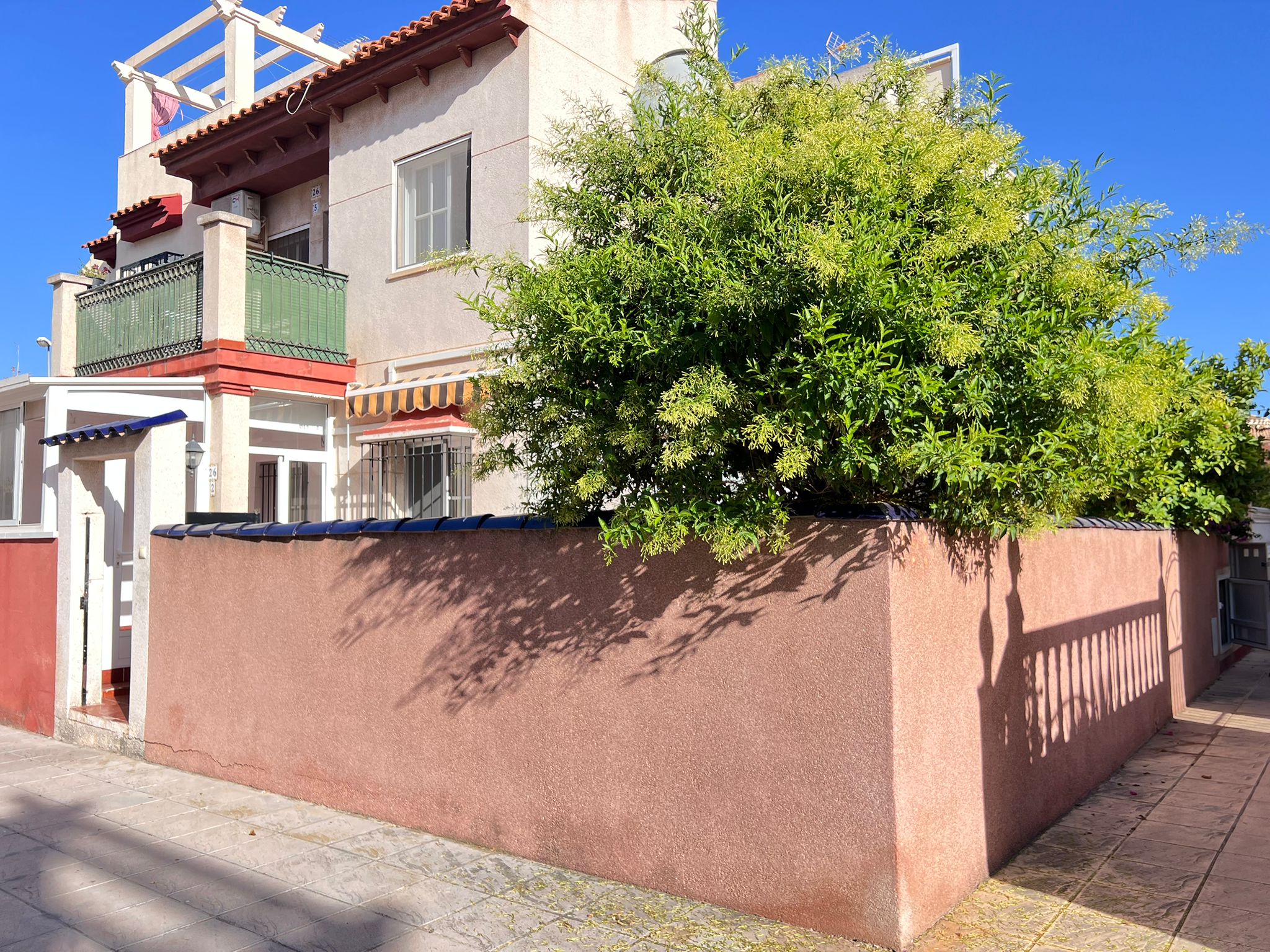 Corner townhouse with large patio and communal pool in Playa Flamenca, Orihuela Costa