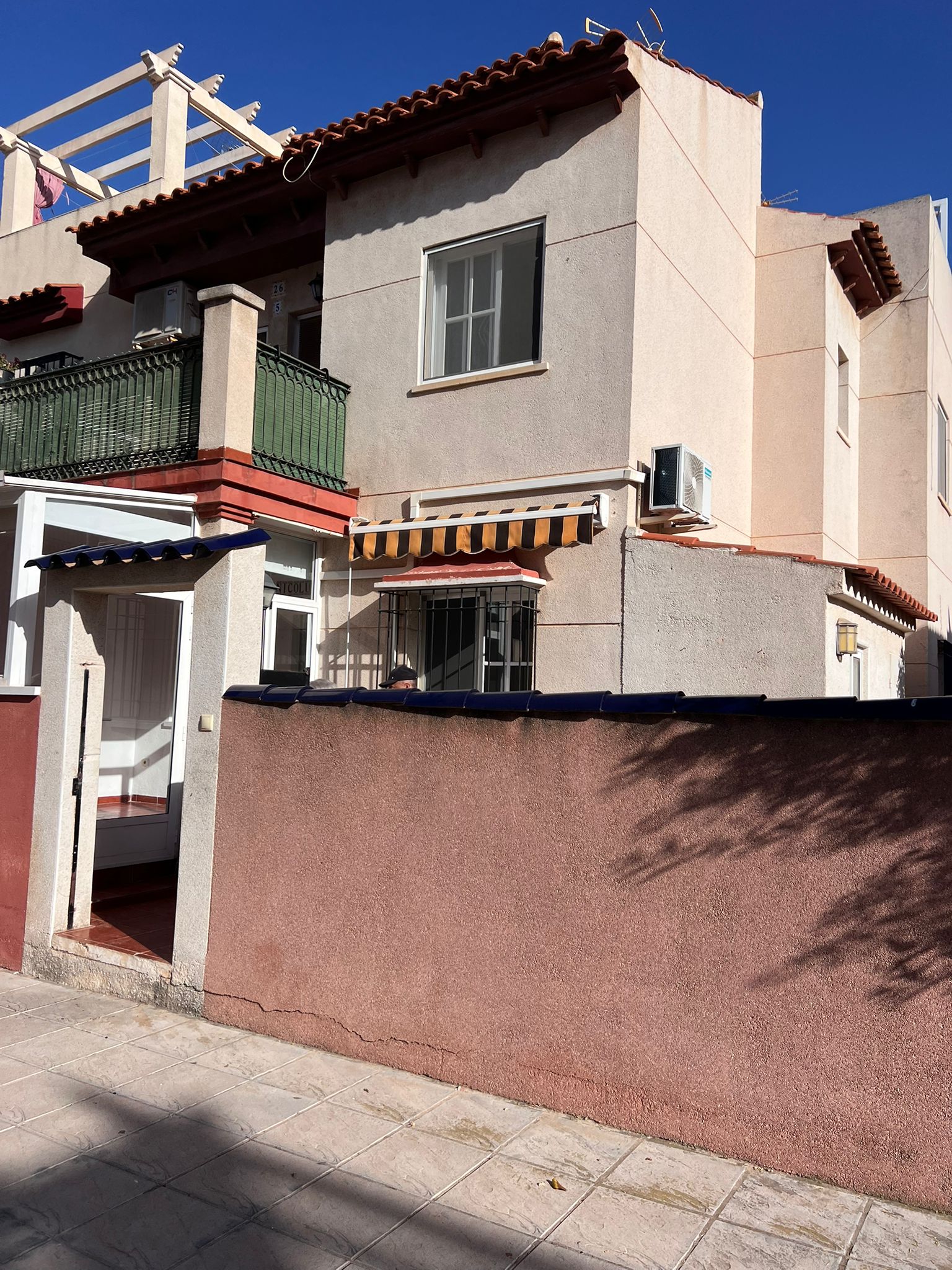 Corner townhouse with large patio and communal pool in Playa Flamenca, Orihuela Costa