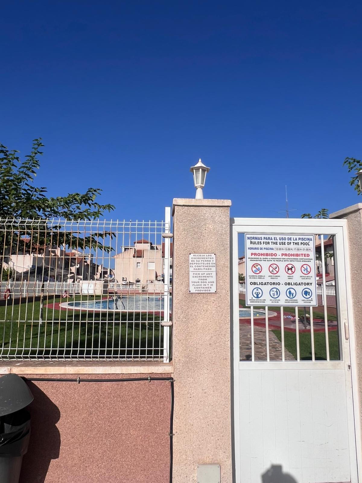 Corner townhouse with large patio and communal pool in Playa Flamenca, Orihuela Costa