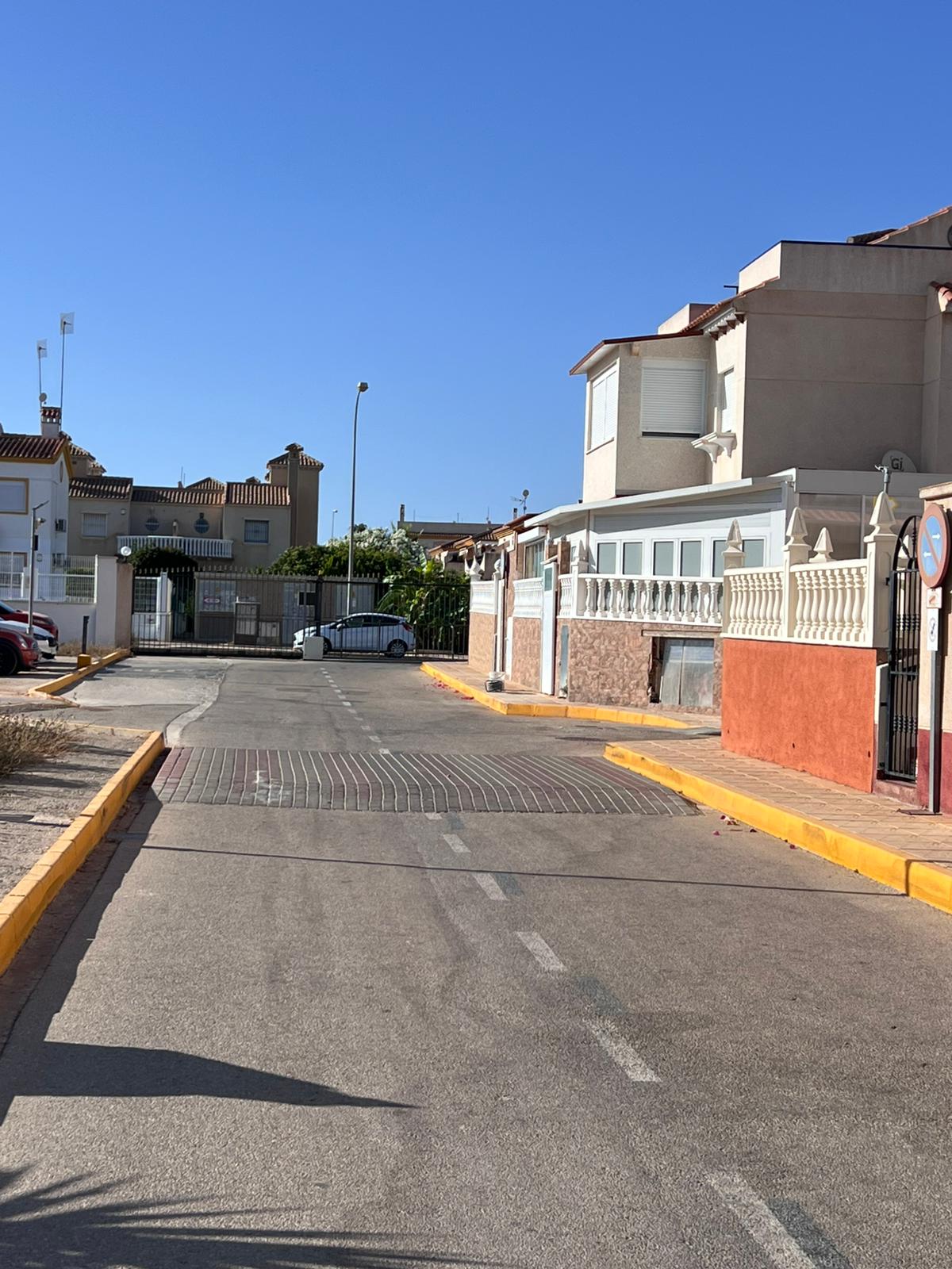 Corner townhouse with large patio and communal pool in Playa Flamenca, Orihuela Costa