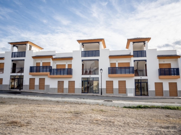 Traditional Two Bedroom Homes in Barrio Herrerias Almeria with Solarium and Community Pool